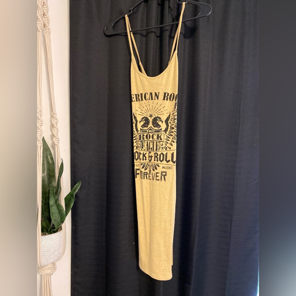 May Pink brand midi dress. Soft, yellow color. Cross-cross back and slit on side